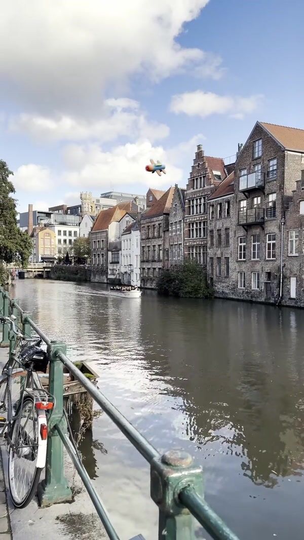 HEMA Toy Airplane Flies Over Canal
