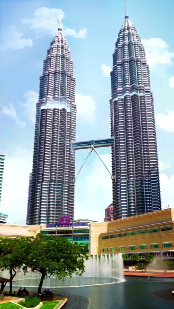 Nescafé Towers Open to Reveal Giant Coffee Bottles