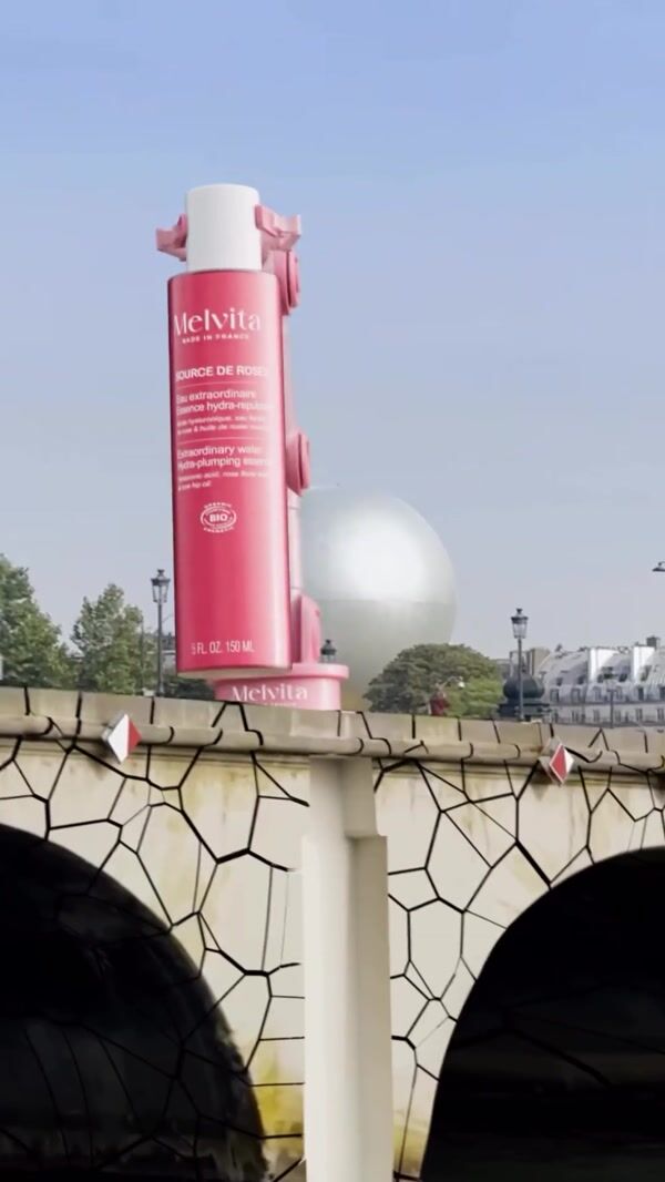 Melvita Giant Bottle Repairs Cracked Bridge