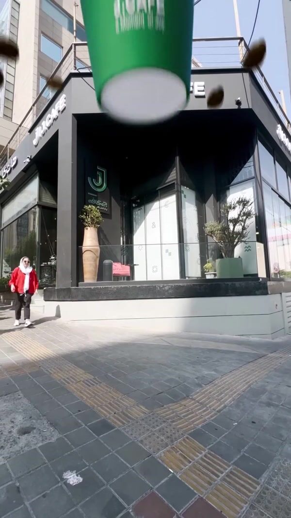 J.Cafe Giant Coffee Cup Falls from Above