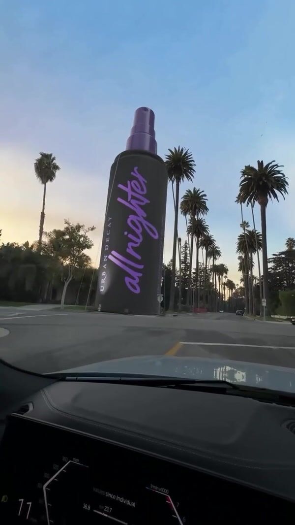 Urban Decay Spray Stands Along Palm Trees