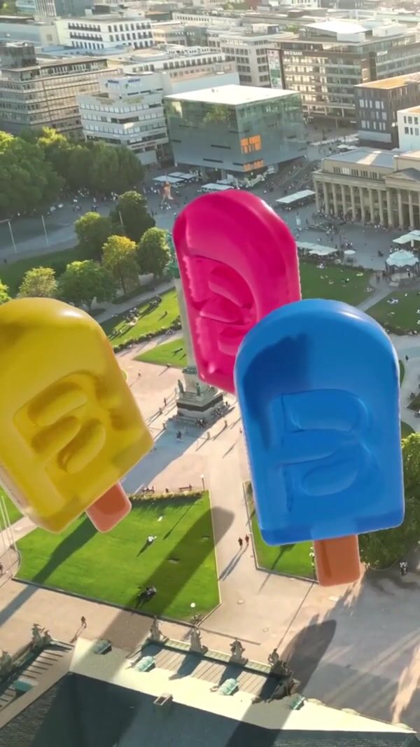 Breuninger Popsicle Balloons Floating Above the City