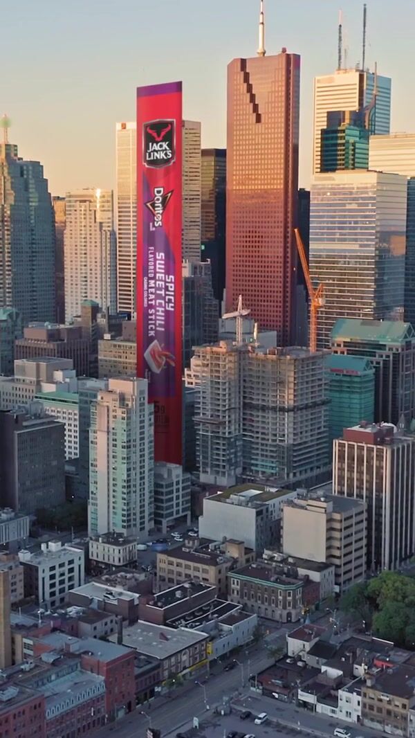 Doritos Tall Banner Display Among Skyscrapers