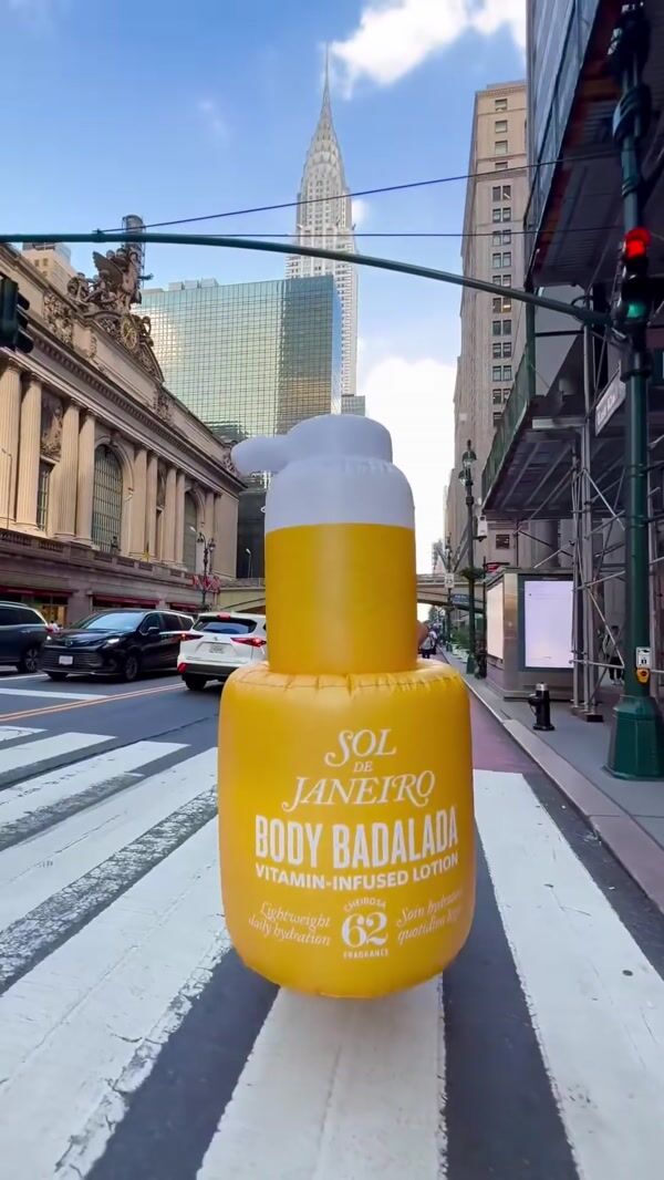 Sol de Janeiro Inflated "Badalada" Crosses Street