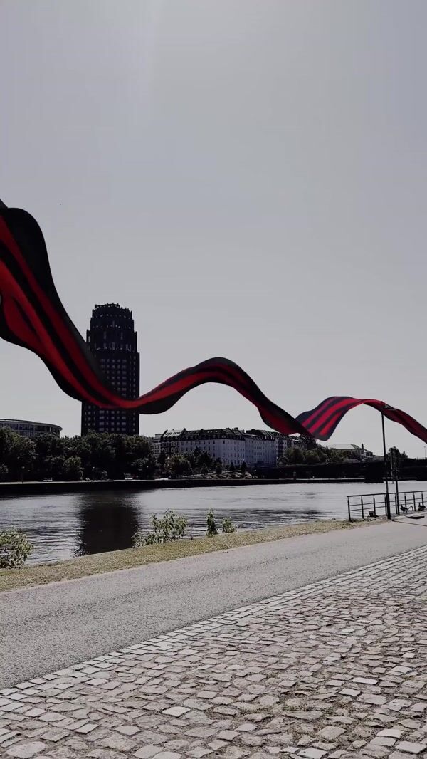 Eintracht Striped Cloth Flying Across the City