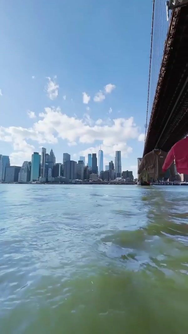 Schott NYC Bomber Jackets Glide Beneath Brooklyn Bridge