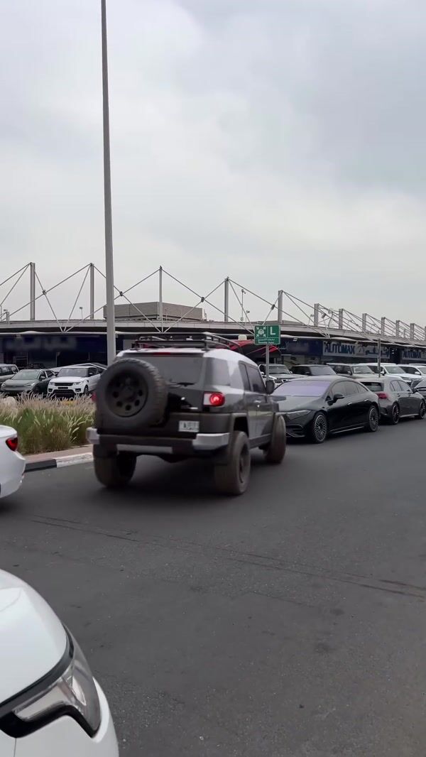 Automax Land Cruiser Parked with Spare Tire