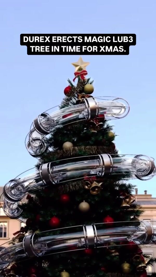 Durex Lube Spiral Tube Around Christmas Tree