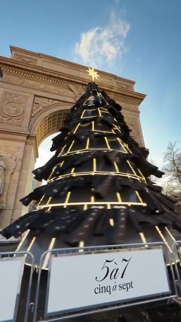Cinq à Sept Black Clothes Hang on Rotating Christmas Tree