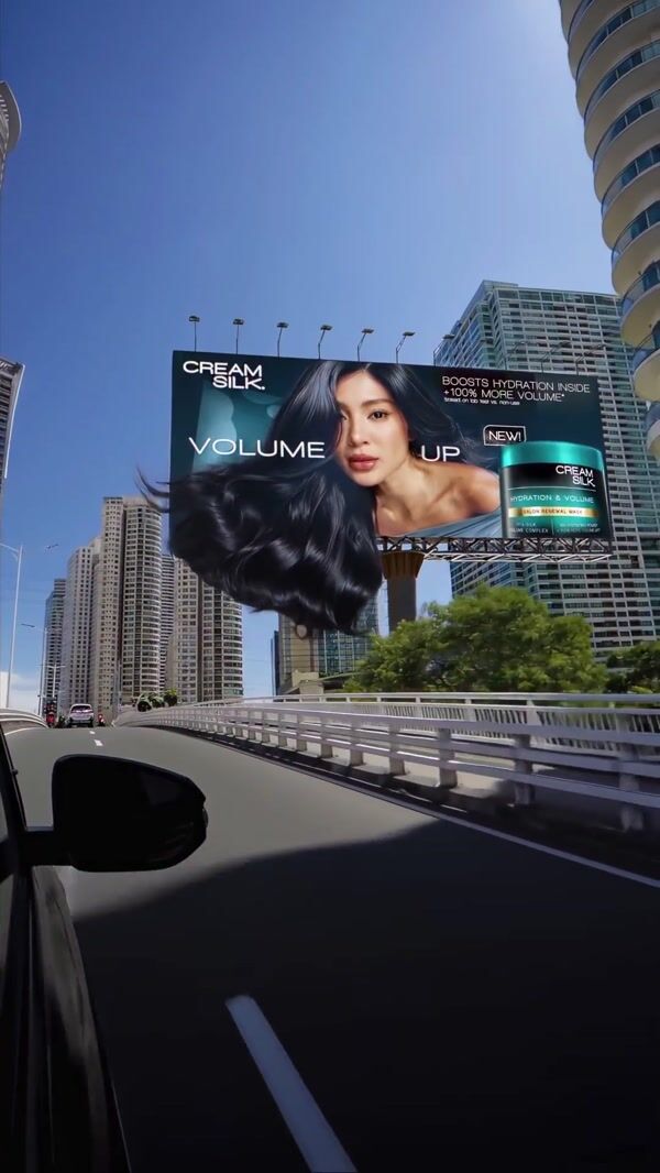 L’Officiel Model's Hair Flows Out of Billboard