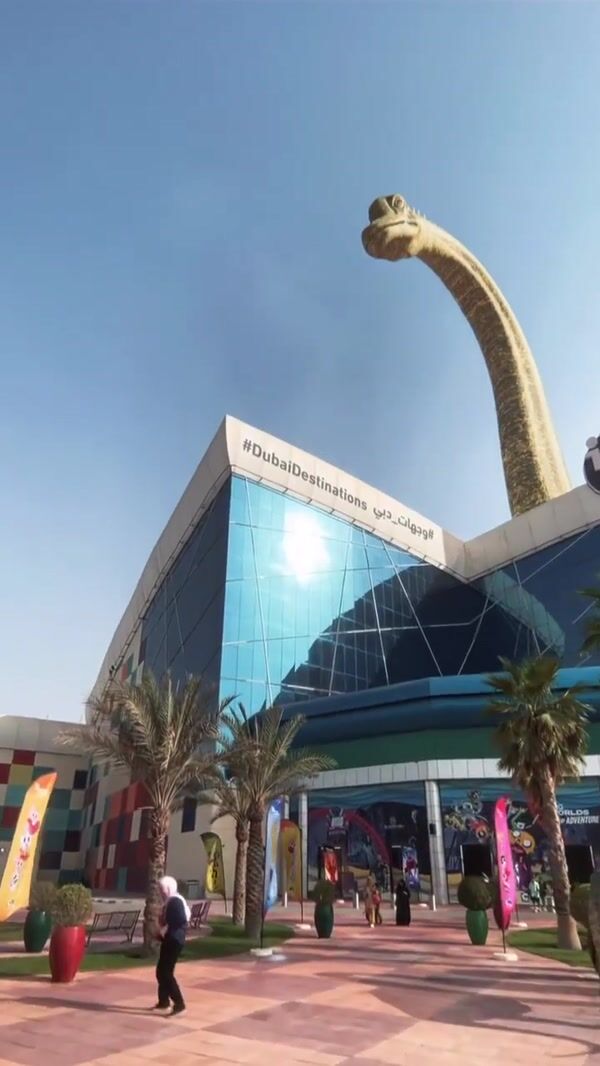 BrandDubai Dinosaur Peeks Above the Adventure Park