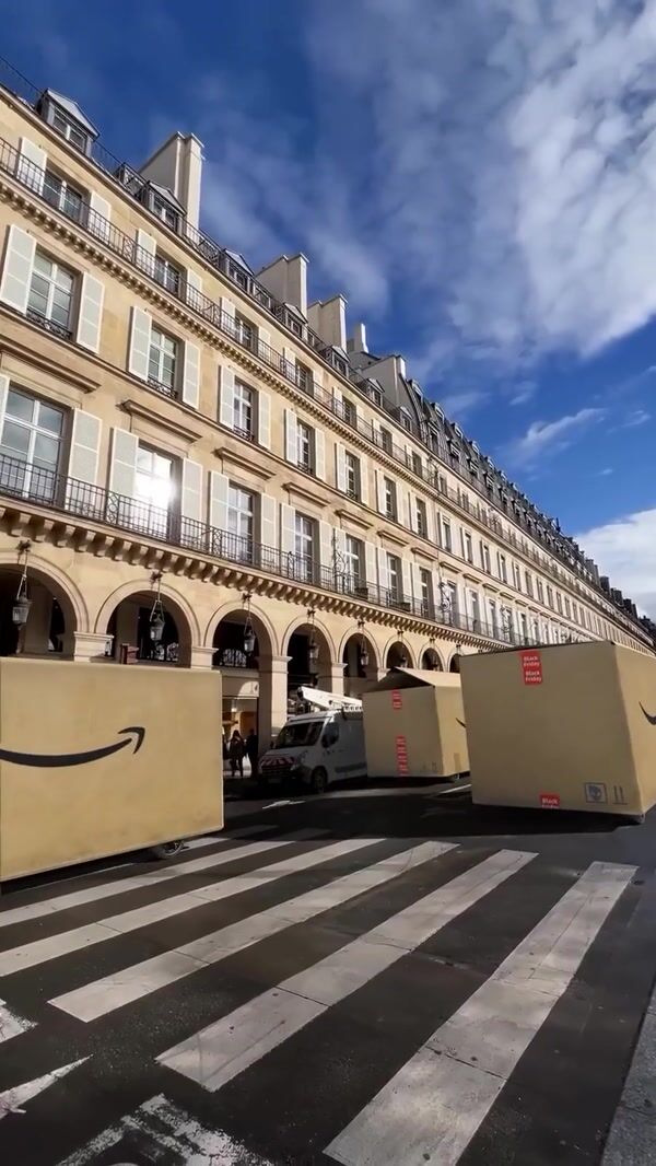 Amazon Zlu Emerges From Giant Box in Paris