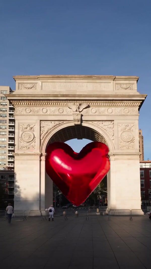 DKNY Heart Balloon Squeezing on Arch
