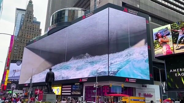 Waves Splash on Screen Forming Whale