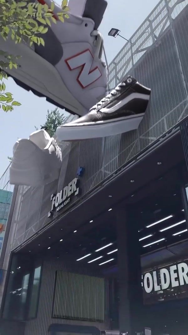 Folder Shoes Installation on Store Facade