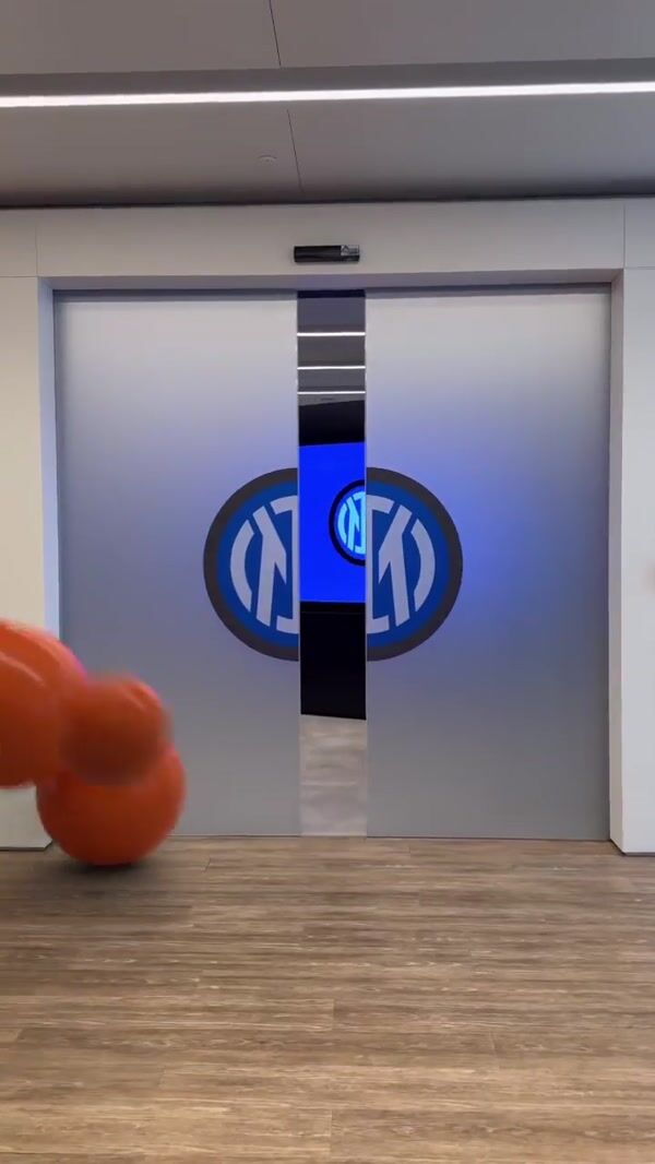 Inter Orange Balls Rolling in the Building