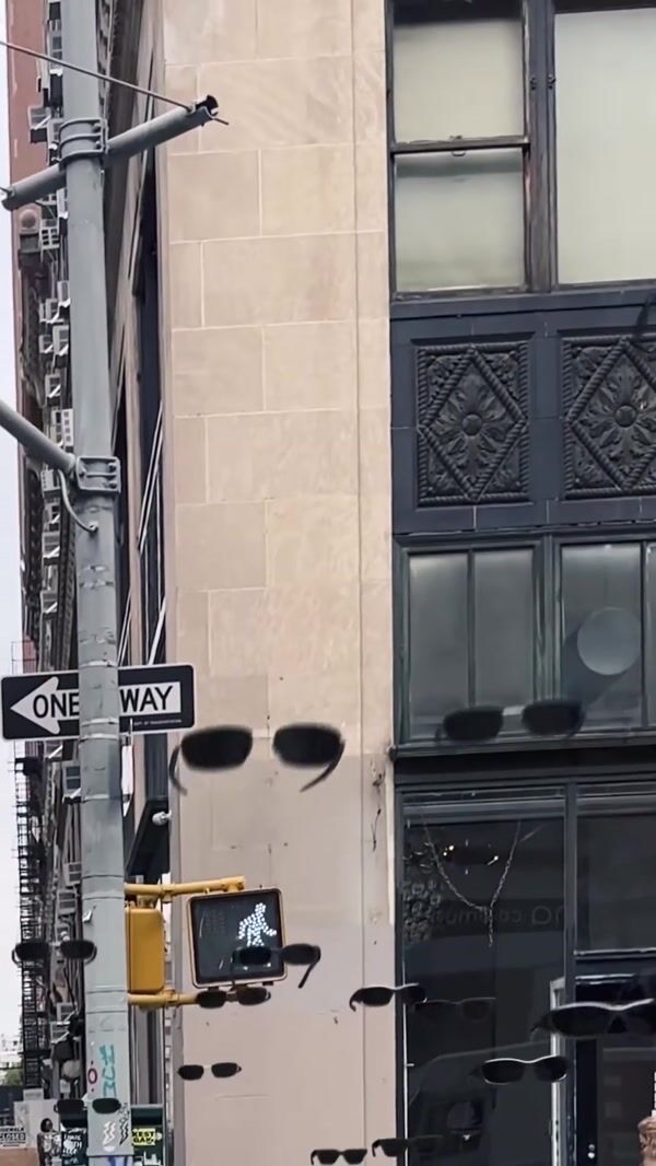 Chimi Black Sunglasses Floating Through the City