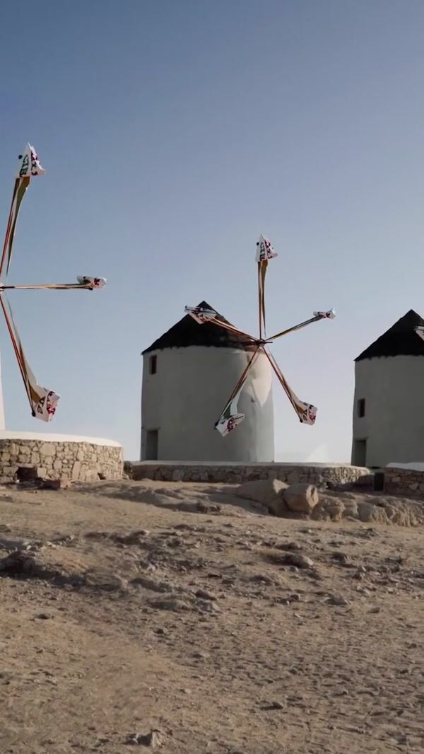 Max Mara Confetti Bursts Out of Windmills