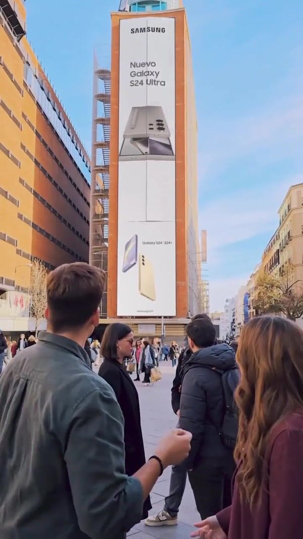Samsung Galaxy Phone Emerges from Building in Callao Square