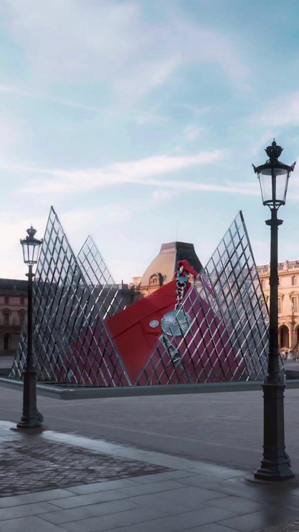 Zadig&Voltaire Red Bag Ascends at Glass Pyramid
