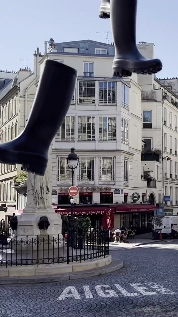 Aigle Black Boots Descending on Street