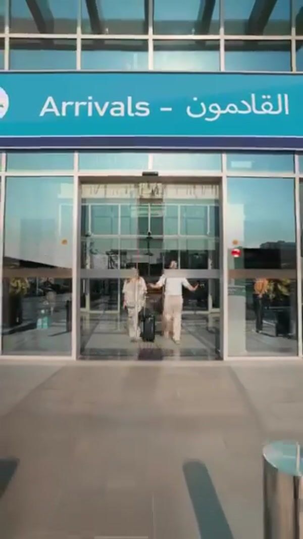 DAMAC Properties Man Pulls Giant Luggage