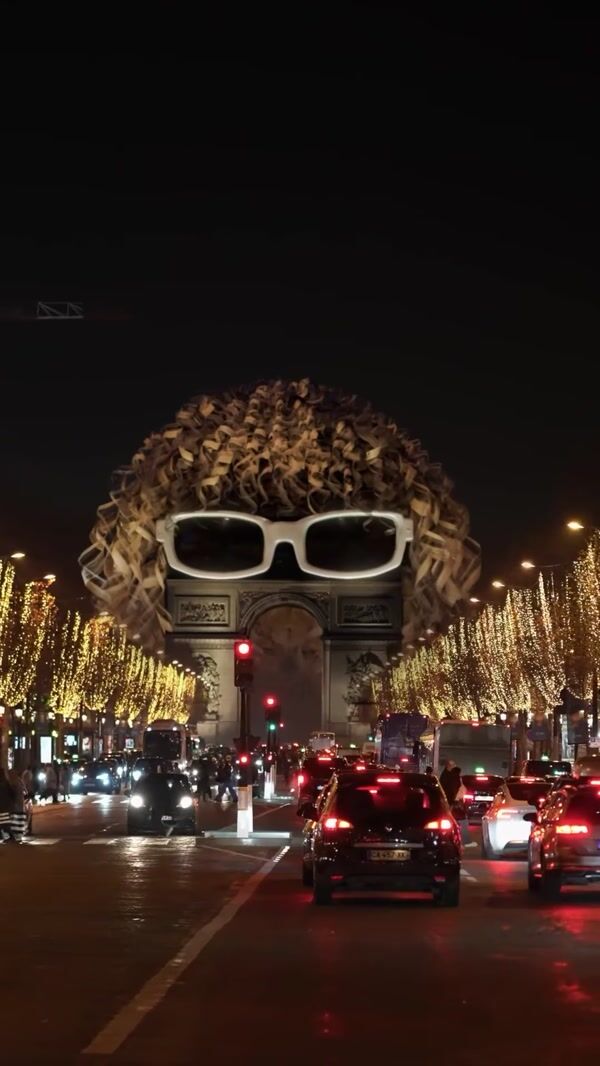 Michel Polnareff Giant Glasses and Wig at Arc de Triomphe