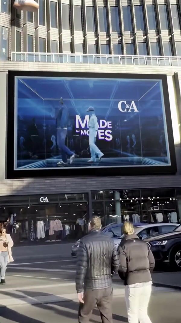 C&A Giant Denim Outfits Dance on Building Top