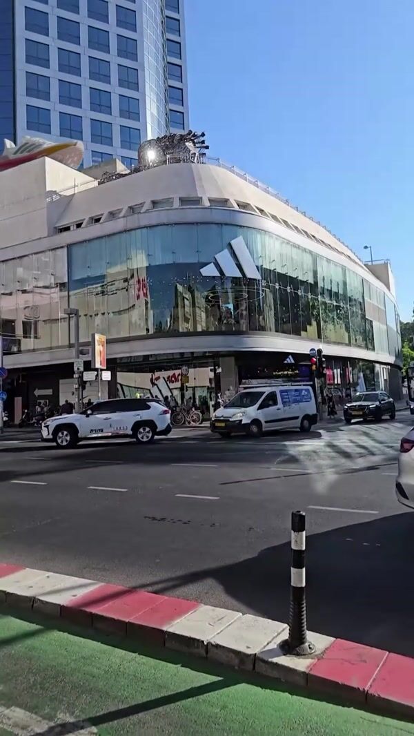 Adidas Shoe Jumps Off at Shopping Center