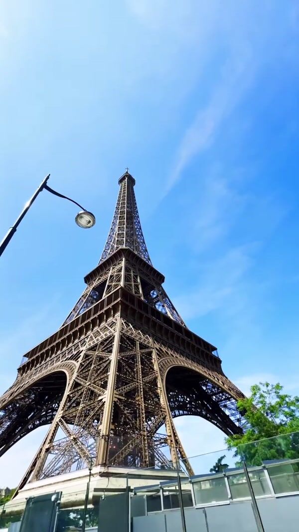 Superman Logo on Banner Attach Under Eiffel Tower